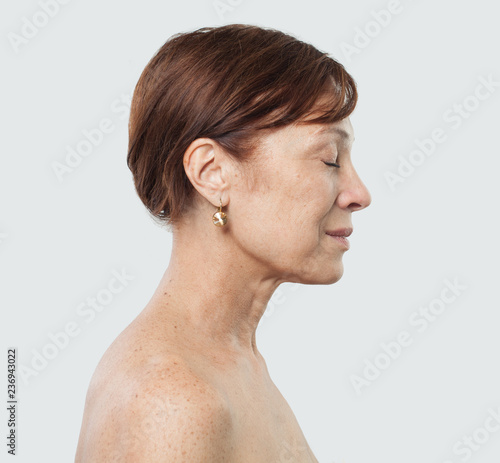 Mature female face. Facial treatment, cosmetology, aesthetic medicine and plastic surgery