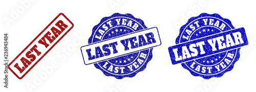 LAST YEAR grunge stamp seals in red and blue colors. Vector LAST YEAR imprints with grunge surface. Graphic elements are rounded rectangles, rosettes, circles and text captions.