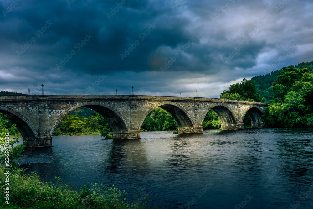 evening shot of bridge over river tay in dunkeld in scotland evening shot of bridge over river tay in dunkeld in scotland