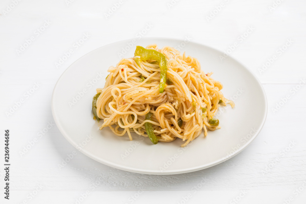 Noodles with bell pepper on plate