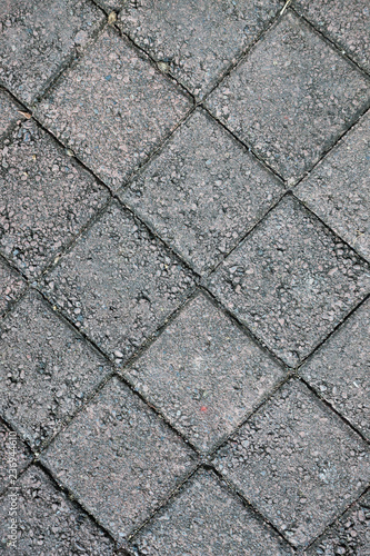Gray concrete tile on the road background texture