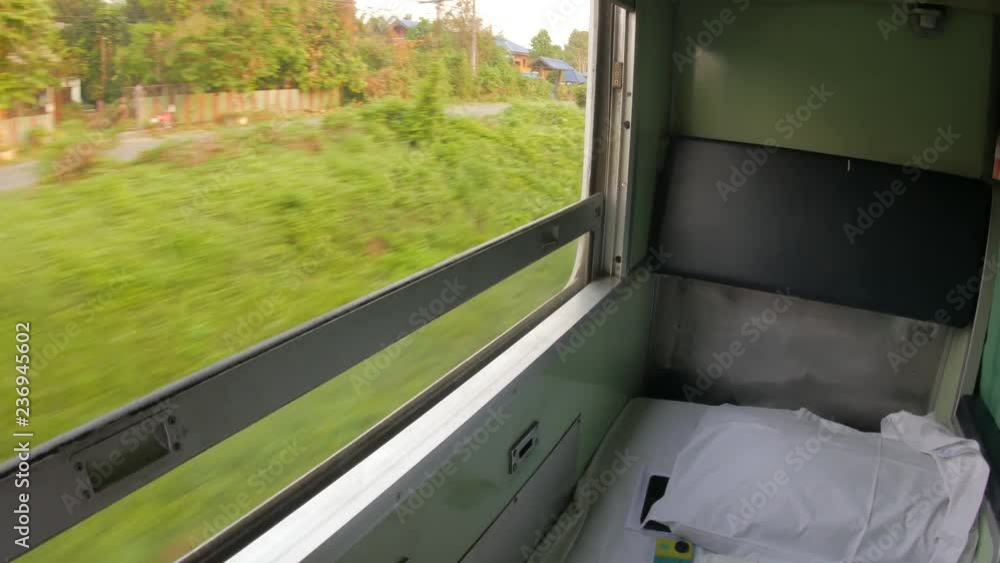 window view on sleeper class a journey by Thai Railway train window view on sleeper class a journey by Thai Railway train