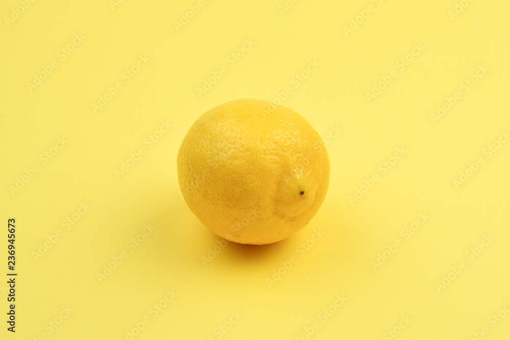 Lemon isolated on yellow background. Lemon isolated on yellow background.