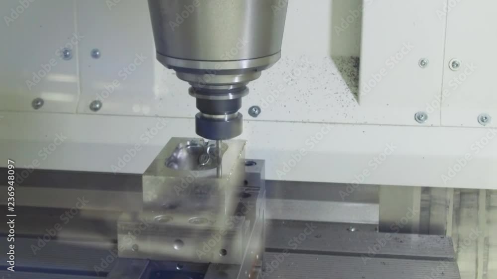 Precision milling CNC machine tool makes part. Precision milling CNC machine tool makes part.