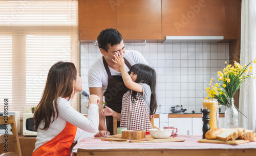 Happy Asian family cooking in kitchen  with happy and smile  lifestyle happy family concept