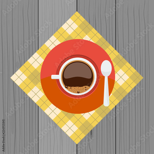 Cup and sauser with coffee, bubbles spoon from top view