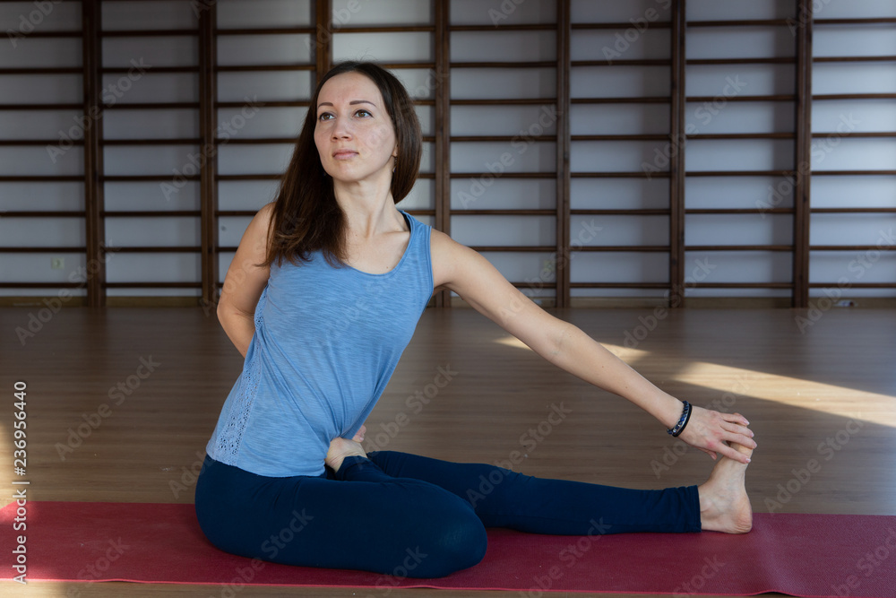 Beautiful woman practicing yoga indoors Beautiful woman practicing yoga indoors