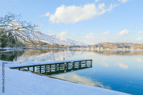 Beautiful fresh snow in winter around the mountains  Lake  with blue sky  background, Nagano Prefecture, Japan.