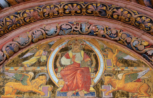 Fotografia, Obraz Jesus Christ surrounded by Four Evangelists (represented as winged angel, lion, ox and eagle) and the fresco above the entrance to the Church of Saint Faith in Selestat, France