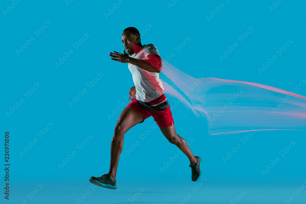 © master1305 - Full length portrait of active young muscular running man,