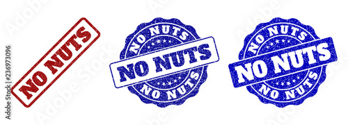 NO NUTS scratched stamp seals in red and blue colors. Vector NO NUTS labels with dirty style. Graphic elements are rounded rectangles, rosettes, circles and text labels.