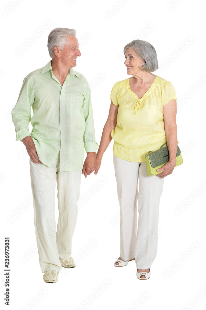 Happy senior couple posing isolated on white background Happy senior couple posing isolated on white background