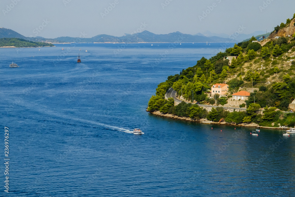 boat on the lake. road to the sea. boats in the bay. view of city of dubrovnik in croatia