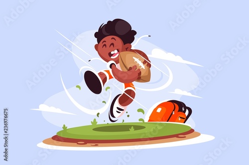 Little boy playing rugby outside