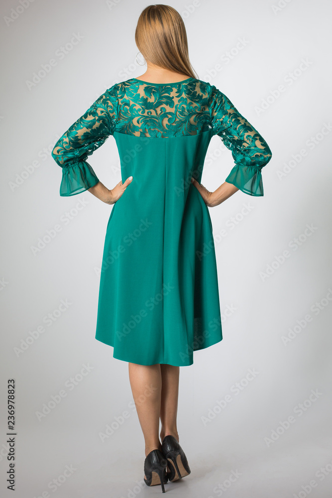 Beautiful caucasian girl posing in green dress Beautiful caucasian girl posing in green dress