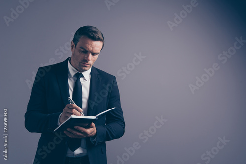 Portrait studio photo of concentrated smart clever intellectual 