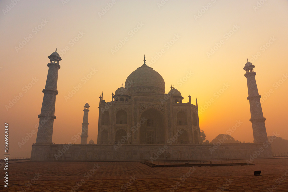 Agra, Uttar Pradesh, India. A view of the Taj Mahal seen during sunrise in Agra