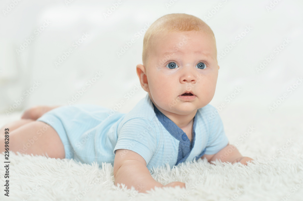Portrait of cute beautiful baby boy on bed Portrait of cute beautiful baby boy on bed