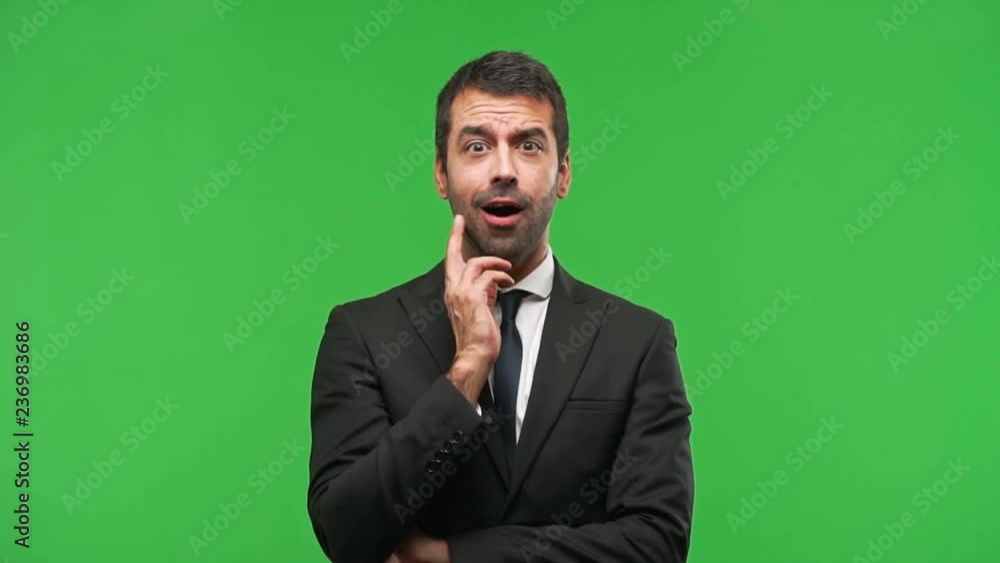 business man gaping because have just surprised with a gift business man gaping because have just surprised with a gift