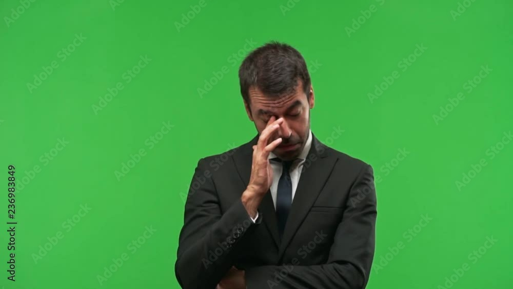 businessman yawning and covering wide open mouth with hand. Sleepy expression on green screen chroma key background businessman yawning and covering wide open mouth with hand. Sleepy expression on green screen chroma key background