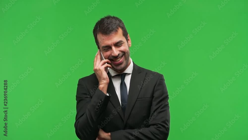 businessman using mobile phone on green screen chroma key background businessman using mobile phone on green screen chroma key background