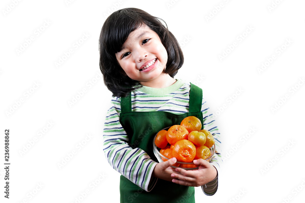 Asian kid with fresh orange. child girl with healthy fruit. Asian kid with fresh orange. child girl with healthy fruit.