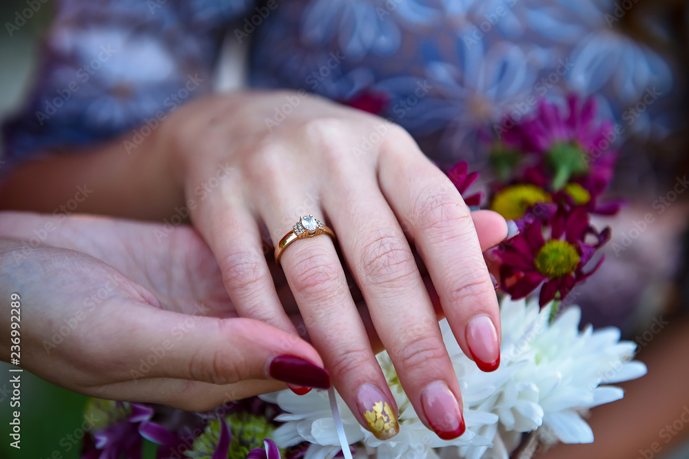 Fototapeta premium hands with wedding rings