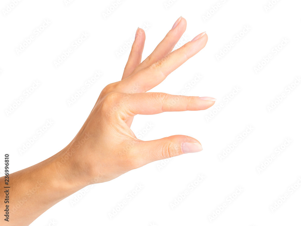 Woman hand holding something little with two fingers Woman hand holding something little with two fingers