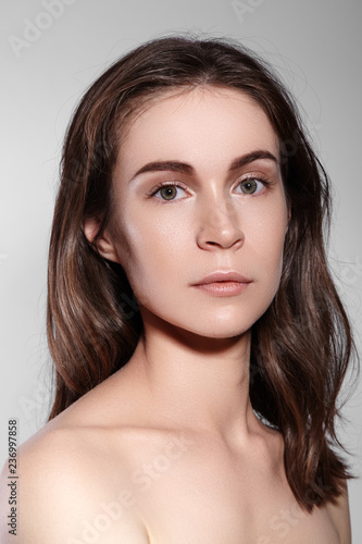 Beauty Woman Face Portrait. Beautiful Spa Model Girl with Perfect Fresh Clean Skin. Youth and Skin Care Concept