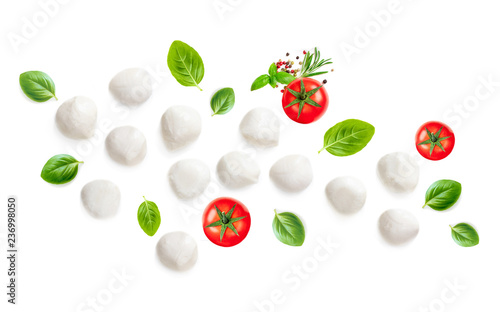 Mozarella, Basil leaf and  Tomatoes  isolated on white Background. Creative layout made of Food Ingredients for caprese salad.  Top view. Flat lay