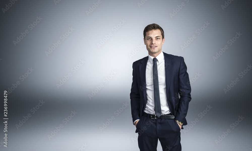 businessman with hands in pocket businessman with hands in pocket