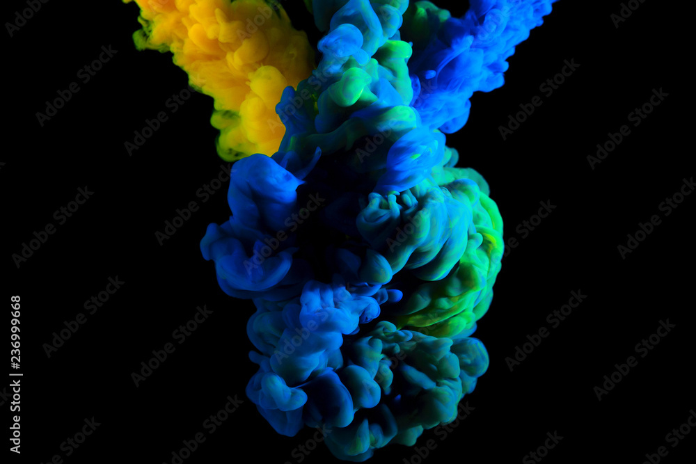 paint stream in water, interlacing of two colors forming a new hue in cloud in water , abstract background, multicolored dye on a black background