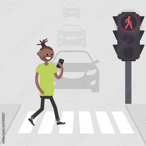 Young american african male character goes on a pedestrian crossing and looking into the phone.addicted to smartphone. Nomophobia. Flat vector illustration