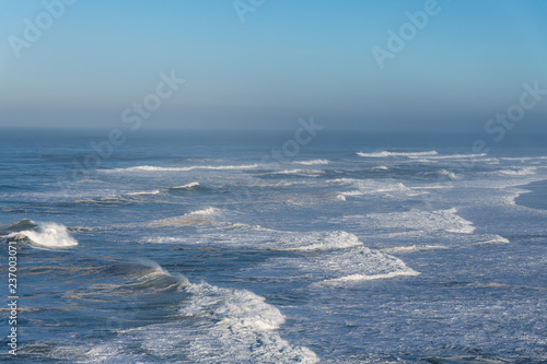 Atlantic ocean waves at Portugal coast next to Nazare city.