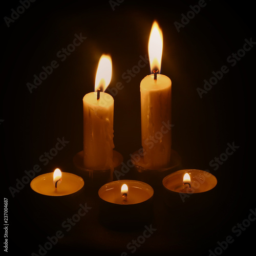 burning candles in the dark