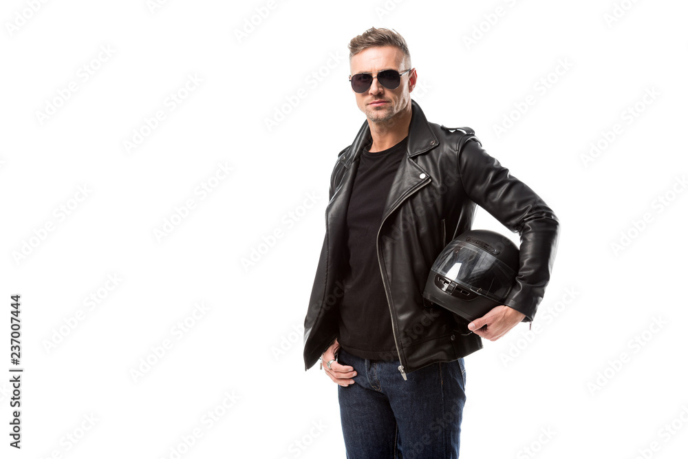 stylish man in leather jacket and sunglasses holding motorcycle helmet isolated on white stylish man in leather jacket and sunglasses holding motorcycle helmet isolated on white
