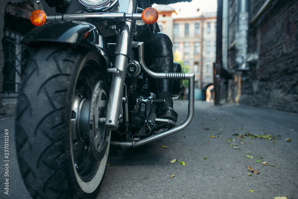 Bearded motorcyclist on classical chopper, biker Bearded motorcyclist on classical chopper, biker