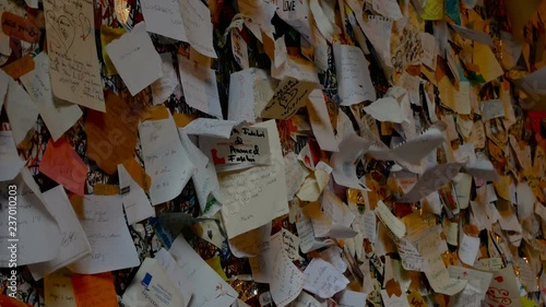 little cards with a loving dedication on the wall of Juliet's balcony