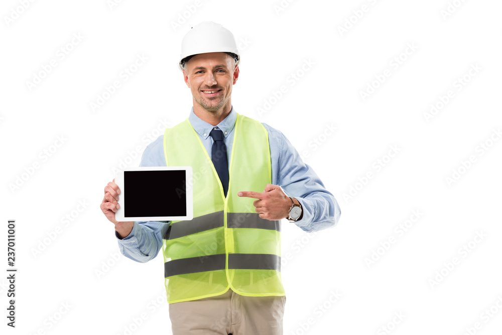 smiling engineer pointing with finger at digital tablet with blank screen isolated on white smiling engineer pointing with finger at digital tablet with blank screen isolated on white