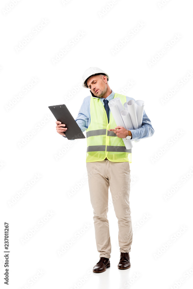 engineer holding blueprints, talking on smartphone and looking at clipboard isolated on white engineer holding blueprints, talking on smartphone and looking at clipboard isolated on white