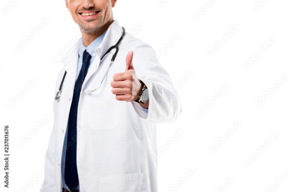 partial view of smiling doctor doing thumb up sign isolated on white partial view of smiling doctor doing thumb up sign isolated on white