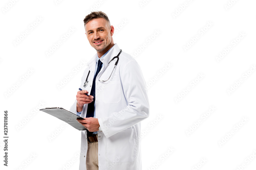 smiling doctor looking at camera and holding pen with diagnosis isolated on white