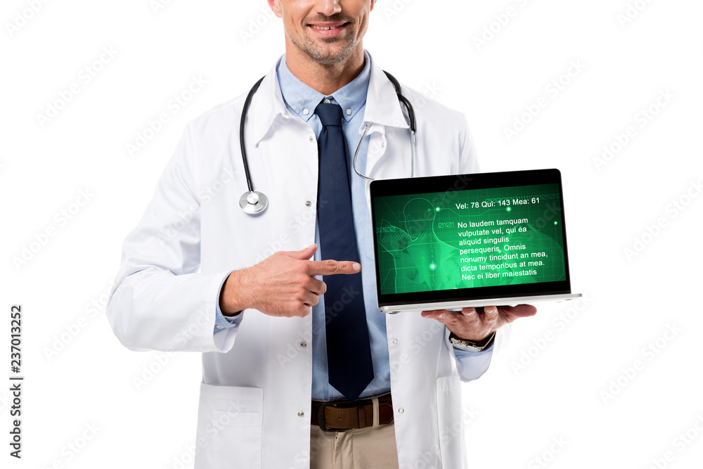 partial view of doctor pointing finger at laptop with health data on screen isolated on white partial view of doctor pointing finger at laptop with health data on screen isolated on white