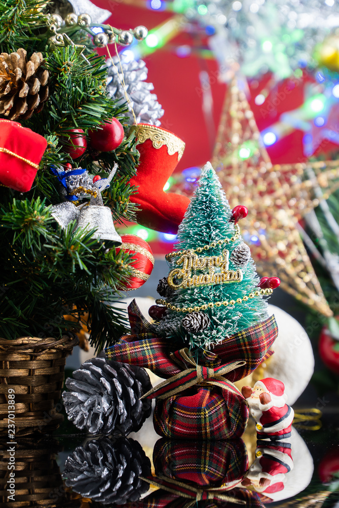 Fototapeta premium Christmas background with decorations and gift boxes on wooden