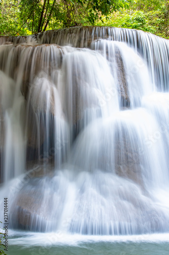 Waterfall flowing from the mountains at Huay Mae khamin waterfall National Park ,Kanchana buri in Thailand.