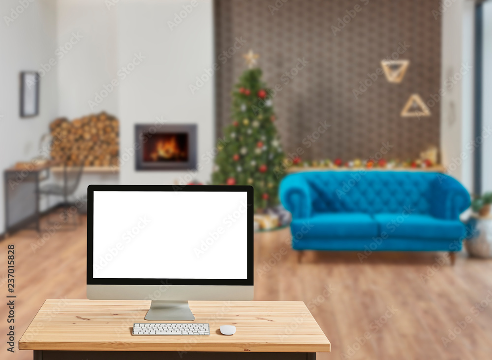 Fototapeta premium Christmas promotion via internet, computer screen and Christmas living room.