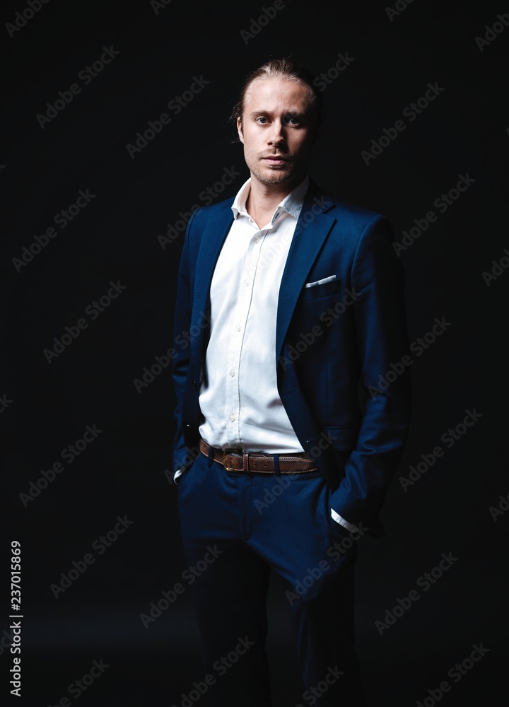 Fototapeta premium Elegant young handsome man. Studio fashion portrait