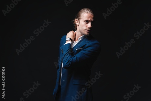 Elegant young handsome man. Studio fashion portrait