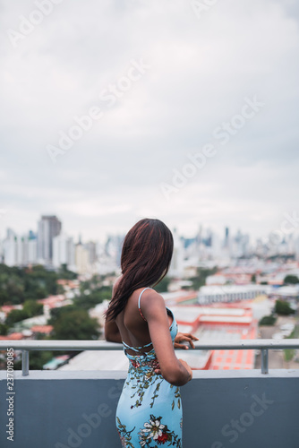 Dreaming woman on panorama of city © kikearnaiz