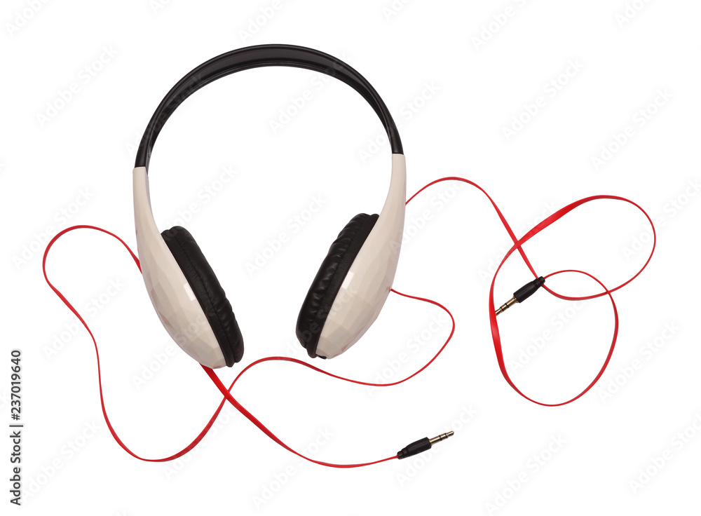 Headphones and cable isolated on white background. Flat lay, top view Headphones and cable isolated on white background. Flat lay, top view
